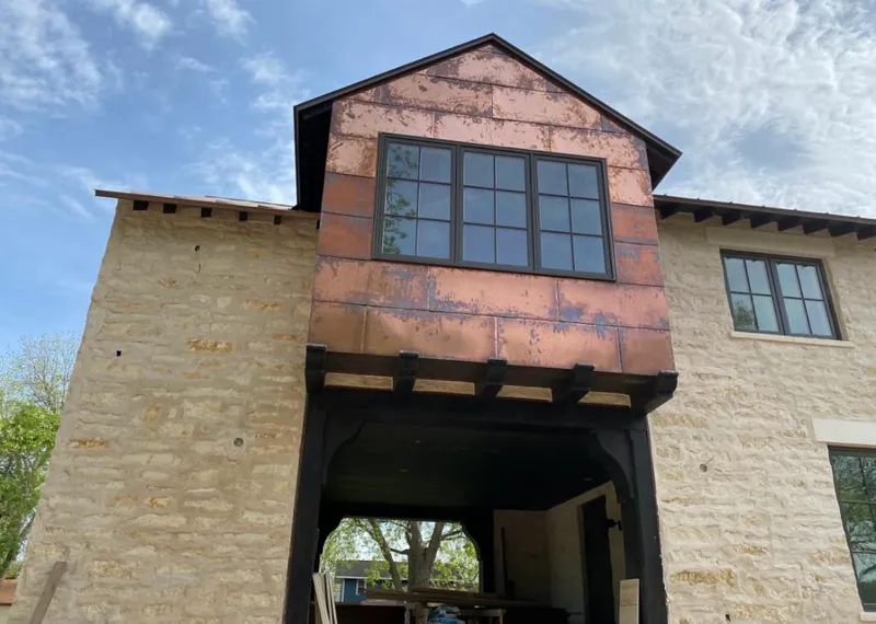 Copper metal panel facade on a stone building for Metal Roof Coating in Livermore